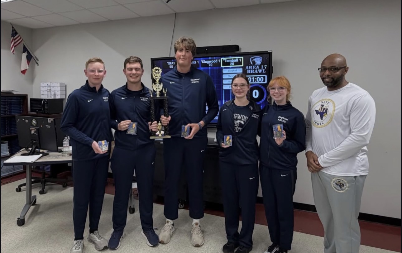Kingwood NJROTC academic team holding their trophy and medals after the Area 17 Brawl competition